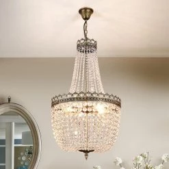 Cheyenne 5-Light Untique Bronze Unique/Statement Empire Chandelier with Crystal Accents by Maxax